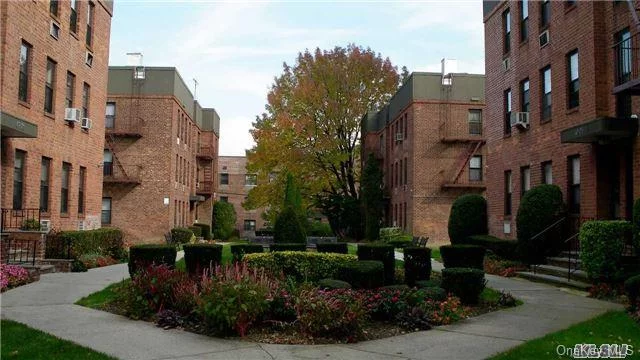 Great Opportunity! Bright Spacious 1 Br Unit On The First Floor Located In Court Yard. Hardwood Floors. All Windows Are Facing Court Yard. Close To Transportation (Buses & Lirr), Shops, Restaurants And Park. No Flip Tax! School District 26. Storage And Garage Available. Bike Room And Laundry Room In The Complex.