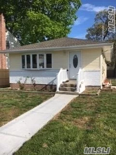 This Fully Renovated Updated Ranch Features 3 Bedrooms, Brand New Kitchen, Brand New Bathroom, New Heating, New Plumbing, New Windows, New Boiler, New Rook, New 4-5 Car Driveway, And A Full Finished Basement W/ Side Entrance To House! Corner Lot! Close To All! A Must See! Wont Last!!
