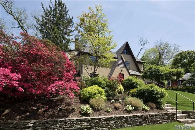 English Country Architecture Accented W/Stucco & Slate/Tile Roof, Well-Located In Manhasset Bay Estates. Perched High On Beautiful Property Meticulously Retained And Landscaped, Home Offers Equal Pleasures Indoor & Out. Light Filled Rooms. Great Bonus Space. Updated Kitchen (Equipped For Michelin 5-Star Chef!) & Baths. 3 Brs, 2.5 Bths.Beach & Mooring W/Membership + Dues