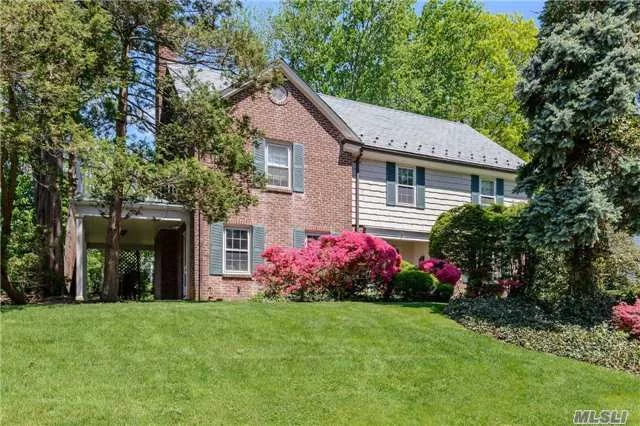 Center Hall Brick Colonial On Beautifully Landscaped Property In Monfort Hills, 4 Bedroom W/ 2 Full And 2 Half Baths. Lr W/ Fpl. Formal Dr, Eik, W/ Breakfast Room, Fam Room, Den, .5 Bath, 2nd Fl. Mbr, Master Bath W 3 Addtl Bedrooms And 1 Full Bath, Full Basement And Playroom