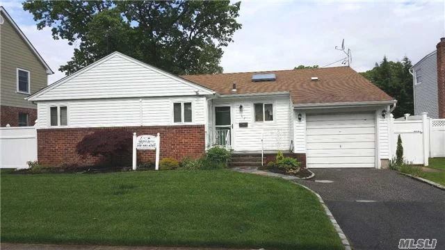 3 Br, 2 Full Bath Ranch In N. Syosset, Newly Refurbished Hardwood Floors, Freshly Painted, New Split Unit Ac, Brand New Fully Finished Basement W/ Full Bath & Laundry, Fenced Property.