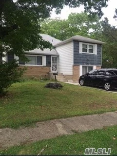Rare 4 Level Split Boasts Master Bedroom, 2 Bedrooms, Full Bath, 2-Half Baths, Huge 97 X 120 Corner Lot, And A Full Finished Basement! Tremendous Potential! Close To All! Wont Last! A Must See!