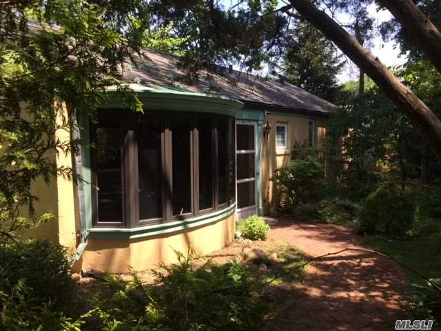 Slate Roof Cottage On Park Like Half Acre. Walk To Private Beach. One Full Bathroom And And Additional Half Bath. Large Brick Patio, Large Attached Greenhouse, Goldfish Pond. Can Be Set Up As One Large Bedroom Or Two Smaller Bedrooms.