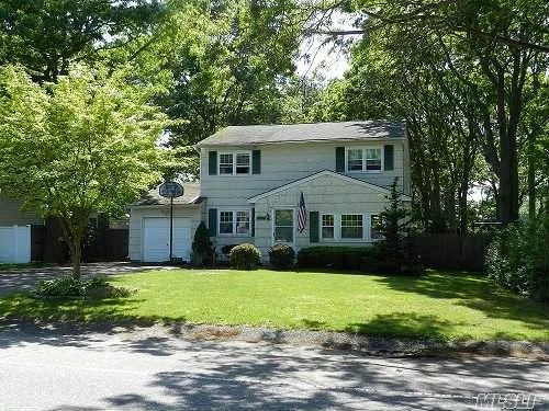 Large Center Hall Colonial In Islip Schools.. 4 Generous Bedrooms, Formal Dining Room, Formal Living Room, Large Eat In Kitchen, Family Room With Wood Burning Fireplace, Basement And 1 Car Attached Garage Large Property 70X275 Taxes W/ Star 10, 223