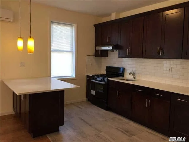 Brand New Renovation. Hard Wood Flooring, All New Appliances. Beautiful Contemporary Style Eat In Kitchen With Countertop Island. Many Windows Throughout The Apartment With Lots Of Natural Light. Bus Stop Right In Front Of The Building, Available In The Q6. 15 Minutes Bus Ride To Lirr Jamaica Station, Subways Are Also Available In The Z, J, E.