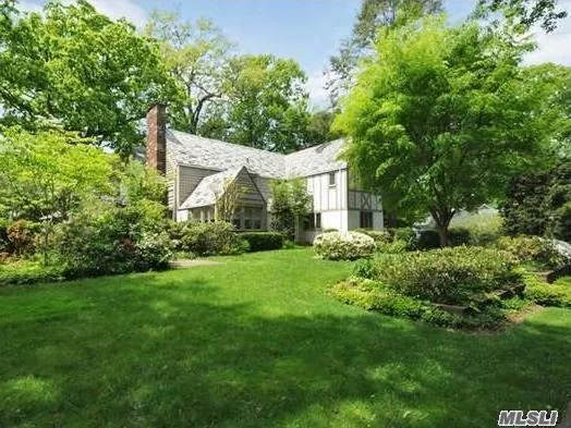 Gracious Tudor In Exclusive University Gardens Perfect For Family Living&Entertaining. Enjoy Its Great Flow, Beautifully Appointed Rooms, French Doors Throughout. Luxurious Master Suite W/Lavish Bath, 2 Large, Custom Walk-In Closets&Gas Fireplace And More.Balcony Overlooks A Lushly Landscaped Double Lot W/3-Hole Putting Green, Granite & Brick Bbq/Bar Too Much To List