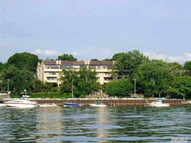 Front Apartment With Beautiful View Of Manhasset Bay From Living Room, Master Bedroom And Terraces. Covered Parking Space.