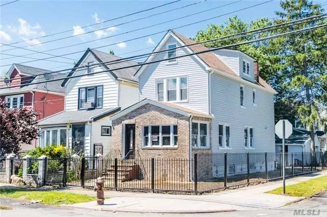 1 Dwelling 4 Br 2 Kitchens Detached, Corner, 3.5 Bath , 2 Car Garage, Gas Boiler.  Prime Location Huge House!! Brand New Hardwood Floors High Ceiling With New Spotlights!! Spacious 4 Bedrooms Space! Finished Basement-Extremely Large Separated Entranced With Bath. 8 Min To F Train.