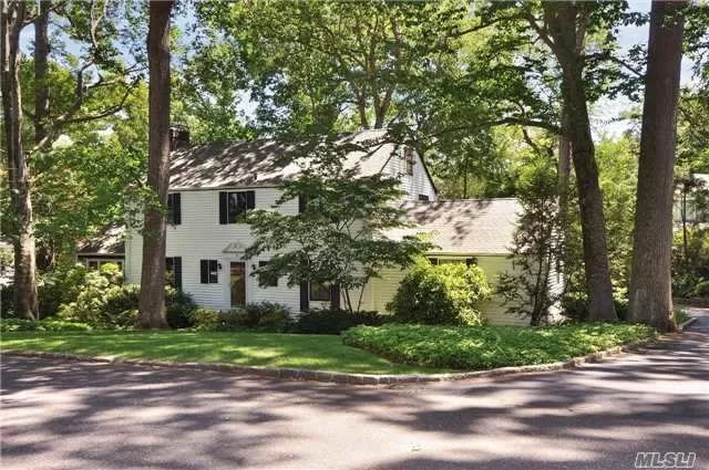 This 1941 4-Bedroom Colonial Exudes Charm With Original Millwork And Gracious Rooms. Meticulously Maintained, This Awaits Your Personal Touch. This Unique Home Affords Extreme Privacy Nestled On Nearly A Third-Acre Property With Professional Yearly Maintenance Of Mature Oak, Beech And Elm Trees With Additional Specimen Trees And Plantings. East Hills Park.