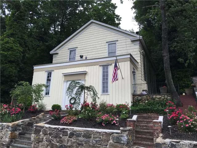 Elegant Historic Home Beautifully Updated To Satisfy The Most Discerning Buyer. Great Entertainment Space, Wide Wood Planks, Recessed Lighting, Create A Dramatic Effect Top Of The Line Appliances, Marble Counter Tops, A Choir Loft, And Beautiful Landscaping Make This A Unique Property. Must See!