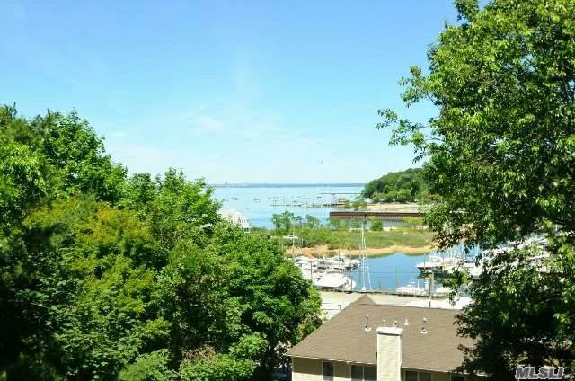 Gorgeous Townhouse Apartment Overlooking Hempstead Harbor With Magnificent Views. Completely Renovated In 2015-16. All New Baths, Kit, S/S Appliances. Must See!