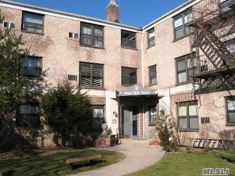 Bright, Airy Larger 2 Bedroom On Top Floor With Views.  Comes With Garage. Walk To Train, Shops. Priced To Sell Quickly!