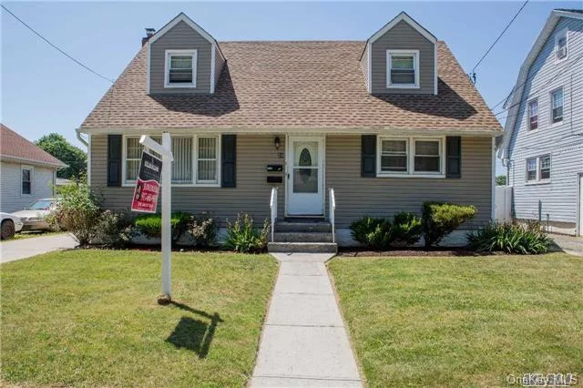 Spacious, Well Maintained, 9 Room Cape. Living Room, Dining Room, Updated Eat-In-Kitchen, 4 Bedrooms, 2 Full Bath. Wood Floors Throughout. Basement Is Finished With Multiple Rooms And Storage Space. Large Backyard With Great Potential. New Siding (2007), New Roof (2011), New Sidewalks & Driveway (2013), 3 Zone Heat.