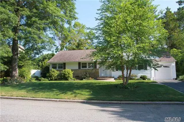 Sitting On One Of The Nicest Streets In Glen Cove, This Beautifully Updated Home With New Kitchen, New Windows, Boiler And Roof. Sunny Family Room Looks Out On The Landscaped And Private 1/4 Acre With Tall Trees And Gardens.There Are 3 Bedrooms And 2 Baths And A Full Basement With A Bath.