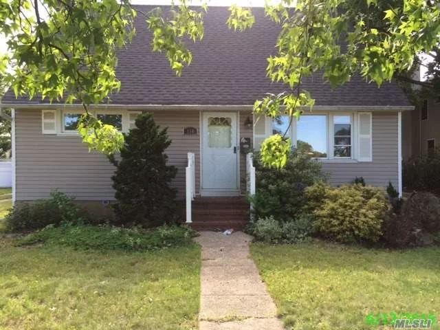 This Is A Fannie Mae Property. 4 Bedroom Cape, Hardwood Flooring, Full Basement, Private Driveway With Detached Garage. Great Opportunity. Close To All.