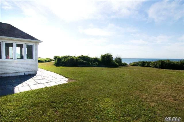 Long Island Sound Location With Best Beach Under A Million Dollars. Seven Rooms With 2 Bedrooms On The Main Level And A Finished Attic Loft Upstairs. New Systems, Open Floor Plan Ready For Your Updating. Great Opportunity With Room To Grow And Maximize Water Views!