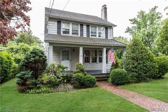 Not To Be Missed, This Classic Front Porch Dutch Colonial In The Heart Of The Park Section Which Is Close Distance To Town, Train & Schools. Features Include: 3 Bedrooms, 1.5 Bath, Lr W/Fireplace, Formal Dining Room, Small Sitting Area Off The Dining Room, Hardwood Floors Throughout, Walk-Up Attic All On Rare Oversized Park Like Property.