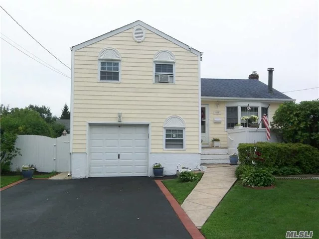 Updated Split On Beautiful Block In Plainedge Schools/ Updated Kitchen Baths, Windows, Siding And Heat System. Living Room With Cathedral Ceilings, Wood Floors, Finished Basement. Sliders Off Kitchen To Rear Deck And Yard.