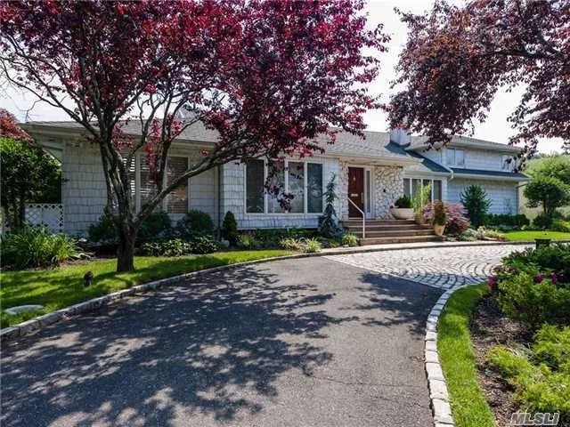 Beautiful Balcony Split. 4 Bedrooms Up, All With Verdant Golf Course Views. Sunny, Above Ground Lower Level With Den With 3 Walls Of Glass Sliding Doors, Bedroom With Full Bath, New Cabinetry And Huge Closets. New Air Con, Heating, Hot Water Systems And Generator. Extra Refrigerator. New Car Garage. Stone And Brick Patio.