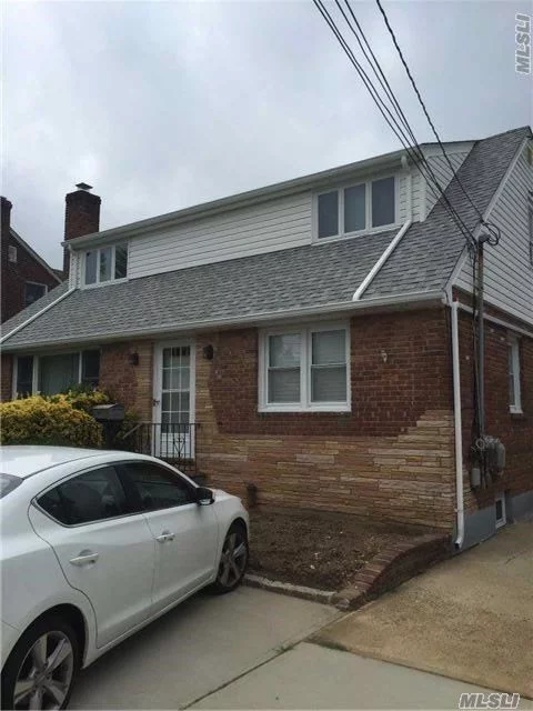 Sunny And Bright Second Floor 2-Bedroom, 1-Bath Apartment In 2-Family House. Close To Lirr And Main St. Off-Street Parking For 1 Car. Access To Washer/Dryer In Basement.