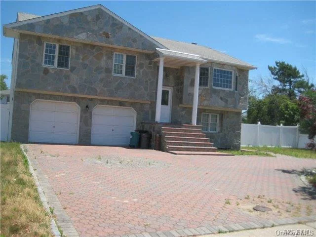 Beautiful Wide Line High Ranch. In Beautiful Copiague Harbor Owner Has Storage Downstairs