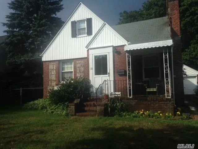 Location, Location On This 4Br Brick Cape, Living Rm W Fireplace, Dining Area, Kitchen,  Hardwood Floors, 2 Full Bths, Full Basement. Home Needs Tlc, Short Distance To Marion Elementary School Or South Middle School.