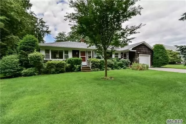 Cozy Ranch In Cutchogue Featuring A Family Room With Fireplace, Living Room, Kitchen, Formal Dining Room, 3 Bedrooms, 2 Full Bathrooms, Full Basement, And 1 Car Attached Garage. Nearby Shopping, Transportation, And More!