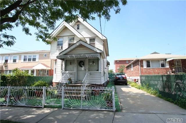 Detached One Family Home On 34 X 102.5 Lot Zoned R4A. Features 4 Bedrooms, Living Room, Dining Room, Kitchen, 1.5 Baths, Full Basement, And Attic. Short Bus Ride To Flushing And #7 Train. Consult Your Architect About Possible Two Family Conversion.