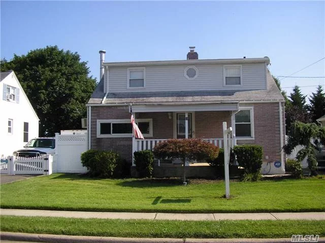 Charming Expanded Cape In Perfect Location-Center Hall Spacious Fdr And Lr-First Floor Bedroom-Many Updates:Some Windows, 1/2Bath, New Bedroom Floors, Hot Water Heater, Water Filtration System Thru Out The House Water Supply, New Paver Patio And Blacktop Driveway.Lovely Florida Room To Enjoy The Changing Seasons.Newer Pvc Fencing