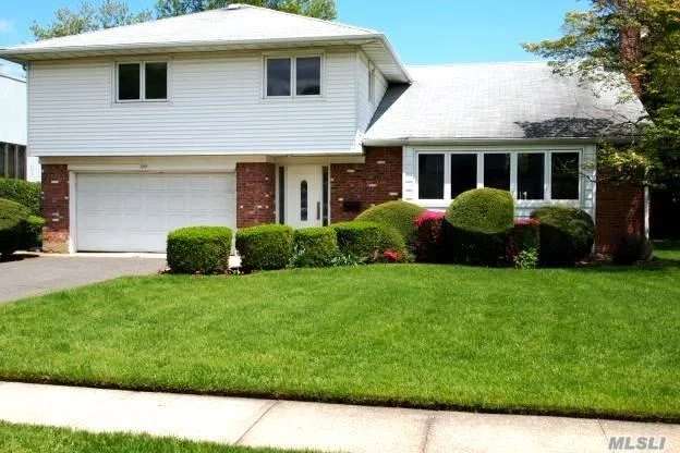 New Bathrooms And Kitchen. Master Bathroom Expanded. New Windows, Hardwood Floors. Mid-Block Location.