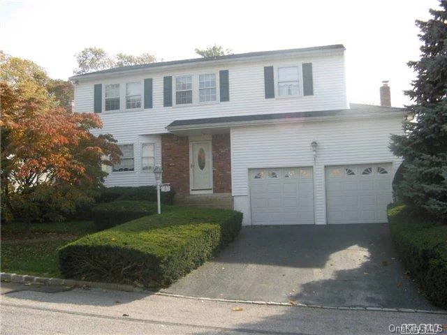 Charming Colonial. Bright And Sunny, 2 Car Garage, Cac, Finished Basement, Bright And Spacious.