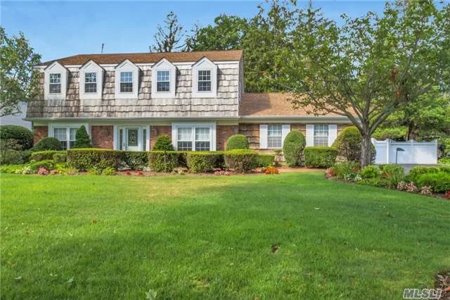 Pace Landings South Of Montauk Center Hall Colonial, 4Br, 2.5 Bth, Lr, Dr, Eik. Located On A Parklike 1/2 Acre Property With 2 Car Garage.