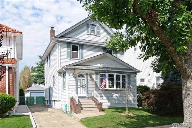 Nice Detached Colonial House In Excellent Condition ! Great Flow With Nice Floor Plan ! New Kitchen , New Bath & New Windows. Beautiful Wood Floors. Best School Dist#26, Closed To Shops. Walk To Q27 Bus To Flushing