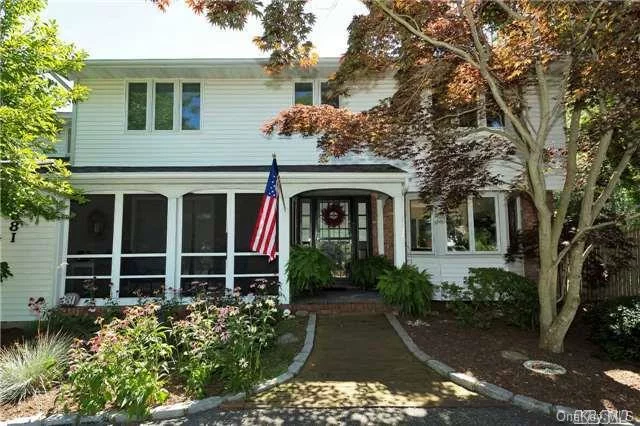 Unique Islip Colonial, 4 Bdrm, 2.5 Bath! Formal Lr & Dr, Screened Frt Porch, Kitchen Opens To Cozy Den W/Fireplace, Oak Flrs, Lge Family Rm W/Vaulted Ceil, Sunny & Generous Master En Suite W/Wic - Overlooks Lge Private Yard. This Spacious Entertainer&rsquo;s Backyard Has 3 Trex Decks, Solar Htd Igp & Glass Out Bldg(As Is), Gas In Street, No Flood Ins Or Sandy Damage! Has C/O&rsquo;s!