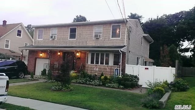 2 Family With Separate Attached Duplex, Great For Investment Or Extended Family. New Gas Heating Systems, Hardwood Floors And Stainless Steel Appliances. Full Finished Basement With Outside Entrance. Main House Should Rent For Between $2750-$2850 Per Month.