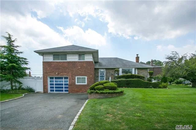 Expanded Spacious Split With Beautiful Hardwood Floors In The Heart Of Clearview Village In Syosset. 4 Bedrooms, 2.5 Updated Baths. Updated Windows, Large Finished Basement. Serene, Beautiful Property W/Covered Patio On Apprx 1/3 Acre, With In-Ground Pool, 1 Car Garage & 2 Car Driveway. Baylis Elem/Hbt Middle School.