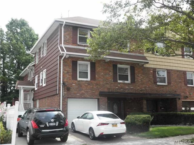 Well Kept Large Split 2 Family House In Excellent Condition ! 7 Bedrooms And 5 Baths + Family Room. Best School Dist#26, Walk To Ps203 & Cardozo High School. Prime Bayside Country Village Location.