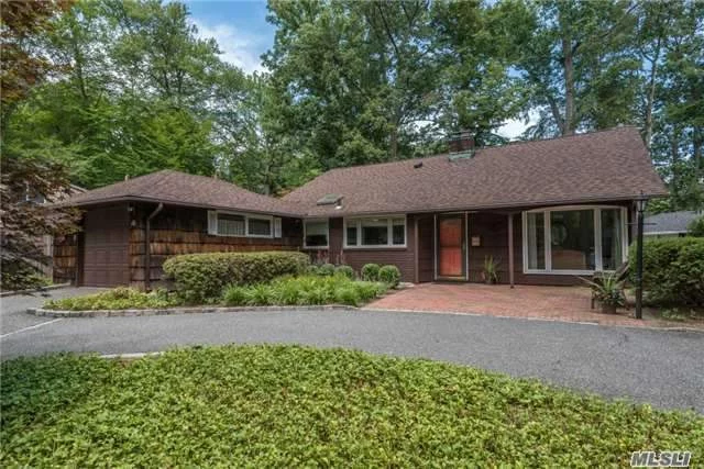 A Graceful Gathering Awaits In This 4-Bedroom, 2.5-Bath, Mid-Century 2 Story Raised Ranch Located In Dosoris Woods On A Lush Private Property With A Low Maintenance Zen Backyard. The Design Maximizes Natural Light With A Vast Open Entertaining Expanse & An Abundance Of Windows Exposing Serene Natural Vistas. New Roof, Pella Windows, Automatic Generator, Updated Kit & Baths