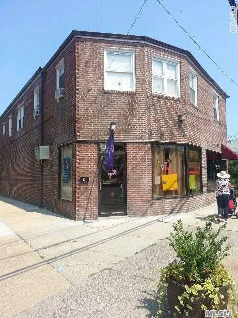 Wise Investment. Beautiful Solid Brick, Income Producing, Corner Property. Two Second Floor Apartment. Two Street Level Stores With Large Windows. 2 Garages. Room To Improve Income, Garage & Office Vacant. Apartments Below Market Value - Mo/Mo. Seller Financing! Shown By Appointment.