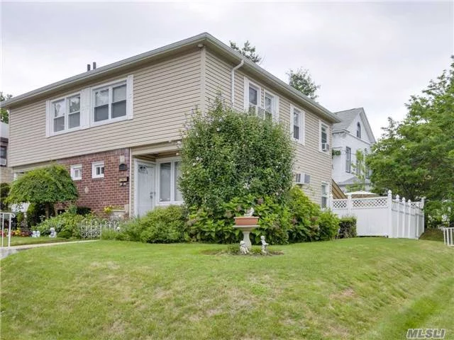 Beautifully Renovated Colonial. 3 Br, 1.5 Bath. Lr, Dr, Kitchen W/ Stain. Steel App. & Granite Counters. Fin Bsmt. New Wooden Floors. 1 Yr Old Roof & Siding. Hunter Douglas Blinds. Fenced Yard W/Paved Patio & Retractable Awning System. Security Cameras. Sd #26 Close To Lirr, Bell Blvd., & Northern Blvd. 2997 Sf Lot. All Info Is Not Guaranteed, Should Be Verified By Buyer.