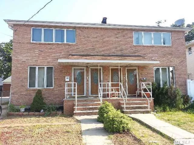 Lovely 2 Family Home, 6 Bdrm With Hardwood Floor, All In Excellent Condition. Lots Of Natural Light Through Windows. Near To Schools, Transportation And Shopping. Only Minutes From Jfk.