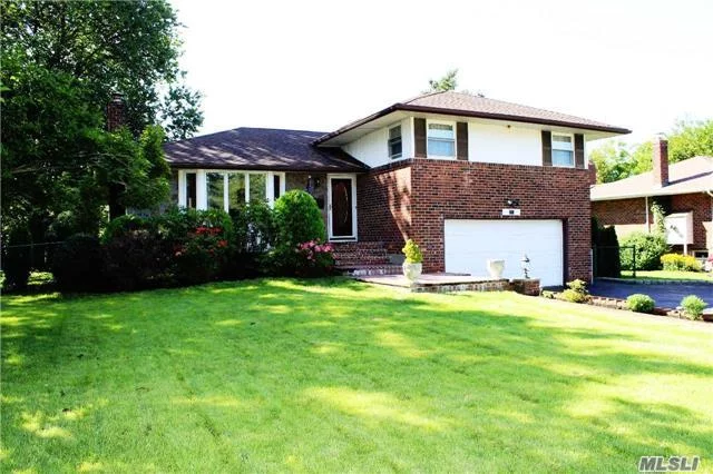 Large Well Maintained Brick Split Features 3 Full Baths, Extended Eik W/ Sliders To Deck Overlooking Patio And Fenced Yard For Entertaining. Lower Level Features 4th Bedroom/ Den For Extended Family Or Nanny&rsquo;s Quarters. Basement Has Summer Kitchen And Loads Of Storage. Brand New Roof And Hot Water Heater, Gas Heating And Cooking, Hardwood Floors. A True Woodbury Best Buy!