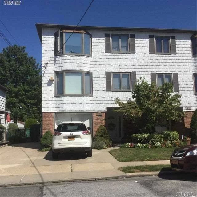 Charming 3 Bedroom, 2 Full Baths Duplex. Eat In Kitchen With Private Laundry Center. Private Parking For 2 Cars. Central Air. Updated Kitchen. Shows Well