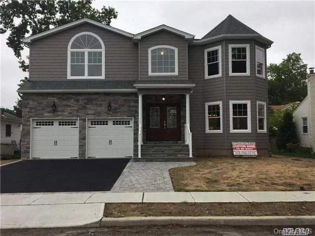 Large 4 Bdrm & 2.5 Bath Rm Gorgeous Colonial W/ 2-Car Gar, Front Paver Walkway, & Full Unfinished Bsmt. Pristine Merrick Manor Location. Photos Are Of Actual Home Completed June 2017. No Amenities Are Spared. Top Notch Energy-Efficient New Construction!