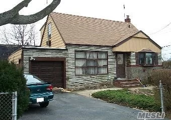 Knock Knock..Thats Opportunity. 4 Bedroom 1 Bath Rear Dormered Cape, With Full Finished Basement. Living Room, Separate Dining Room And Elk. Hardwood Floors. Close To Shopping. Needs Tlc. Fantastic Buy For First Time Homeowner Or Investor.