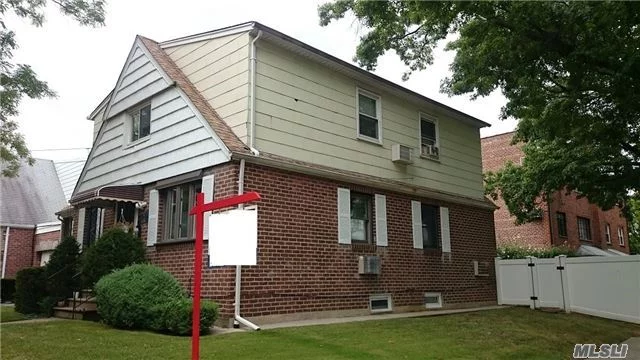 Beautiful Legal Two Families, 2 Br Over 3 Br. 1Fl Duplex With Basement, Glass Slider To Private Backyard,  School District 26, Excellent Neighborhood. Near Shopping. Better Hurry !!
