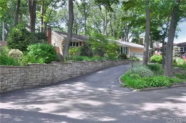 This Beautiful Sprawling Ranch Is Situated On Well Over Half An Acre Of Flat, Usable, Private Property In A Quiet, Residential Neighborhood. This Home Features A Bright, Open Floor Plan, A Large Eat-In-Kitchen With Granite Counters And Stunning Views Of The Park Like Property. The Tranquil Back Yard Includes An Historic Pratt Estate Horse Trough Water Feature.