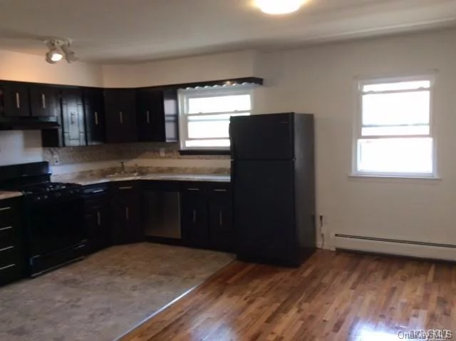 Great Value: Heat, Water, Washer/Dryer,  Garage, Driveway, Outdoor Spac Included. It Is Close To Long Island Railroad (Lirr) Bayside Station, Bell Blvd Restaurants And In School District #26. This Immaculate Apartment Has A Central Location With All Brand New Appliances Including A Steam Lg Wash/Dryer And A Dishwasher. A Must See.