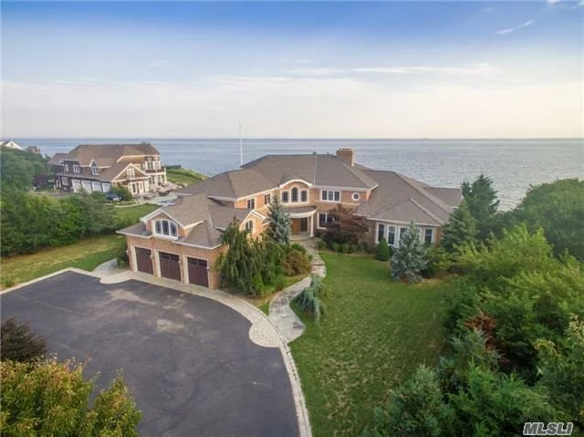 Bayfront With Docking, 7000 Sf All Brick Estate Home, 12 Rooms, 6 Bedrooms, 4 Full Baths, 1 Powder Room, Full Basement, 3 Car Garage, 1.1 Acres, Private Cul De Sac Location, Stunning 2 Story Foyer With Custom Artisanal Iron Stairway Railings, Gorgeous Views Of Great Southbay , Indoor 20X40 Gunite Pool, Very High End Bathrooms And Kitchen, High Elevation.