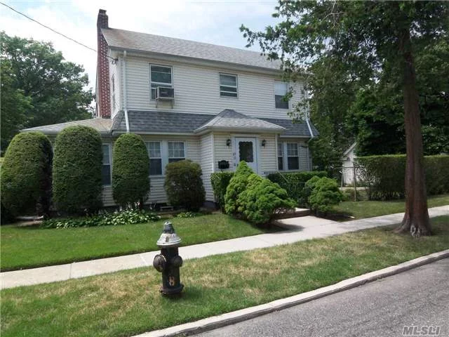 Nice Colonial On Corner Property With Det Garage.Large Lr/Fireplace, Sunroom Of Lr, Formal Dining Room.Needs Some Updating, Great House For The Money!